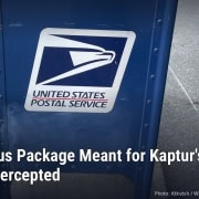 A blue U.S. Postal Service collection box, with headline: Suspicious Package Meant for Kaptur's Toledo Office Intercepted